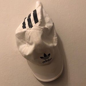 Adidas white trefoil hat with minor makeup stain